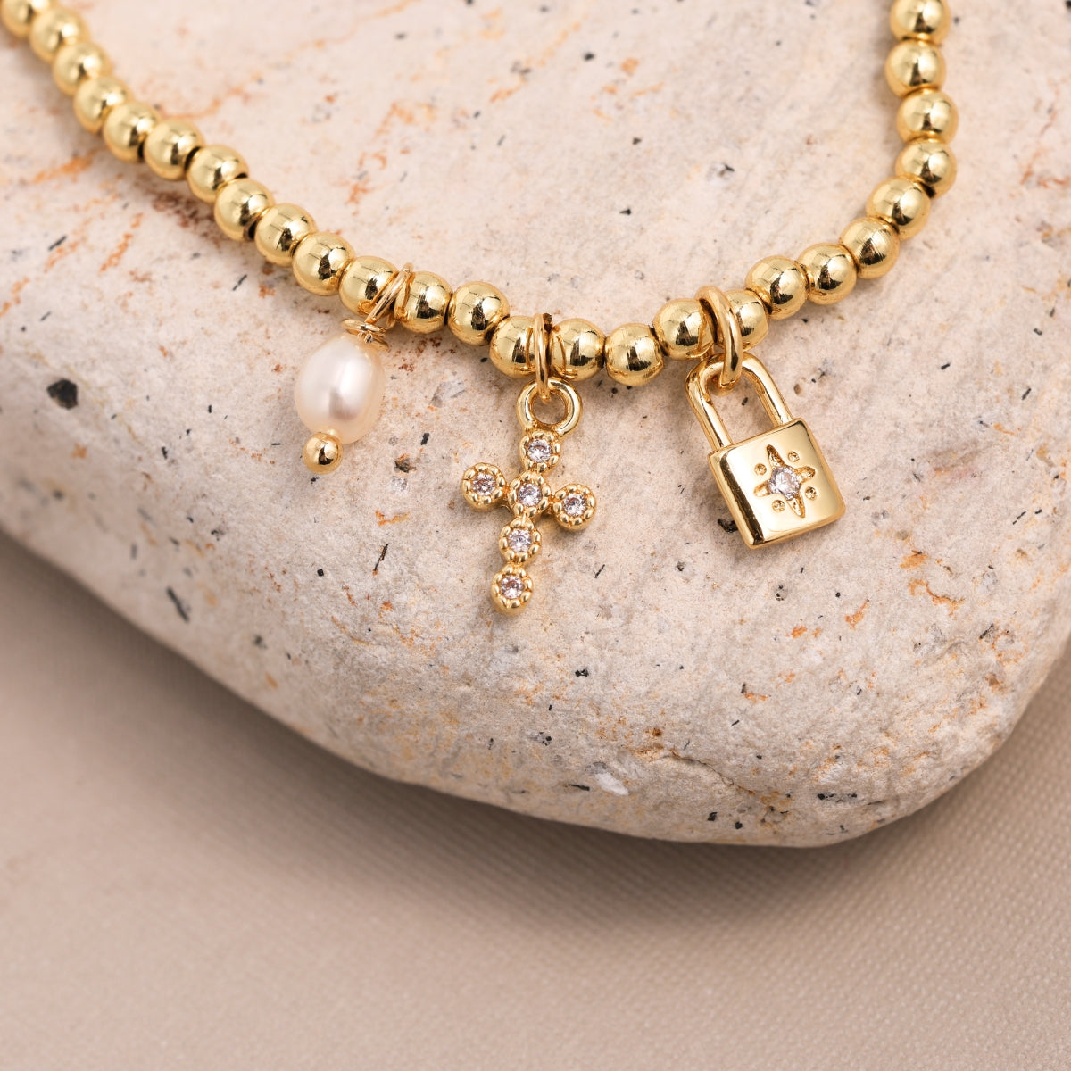 The Devotion Lock and Cross Bracelet