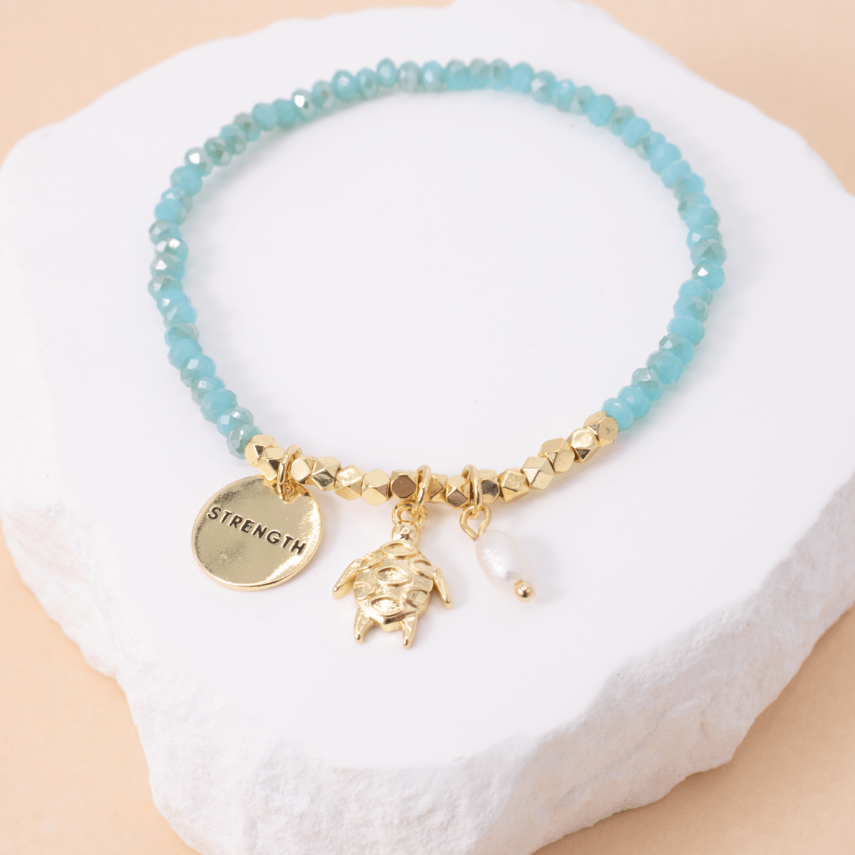 Turtle and Strength Stretch Charm Bracelet - Splendid Iris
