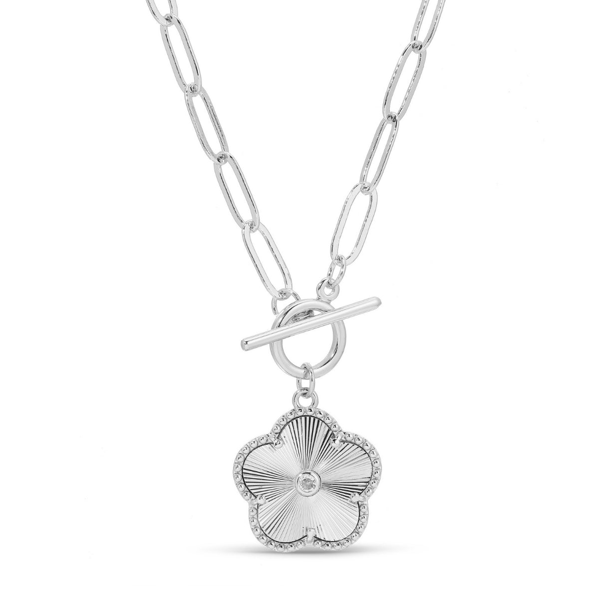 Silver necklace with a floral pendant on a white background